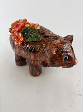 Animal Sculpture - Wombat orange flower