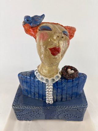 Flat Lady Sculpture with birdsnest