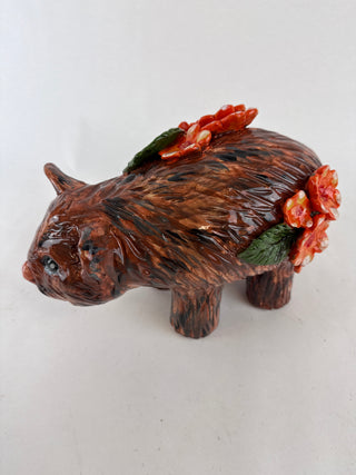 Animal Sculpture - Wombat orange flower